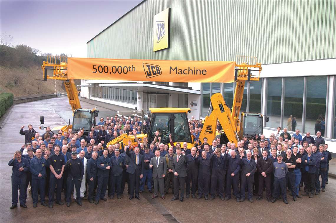 2004 - employees celebrate the productino of the  500,000th JCB machine.